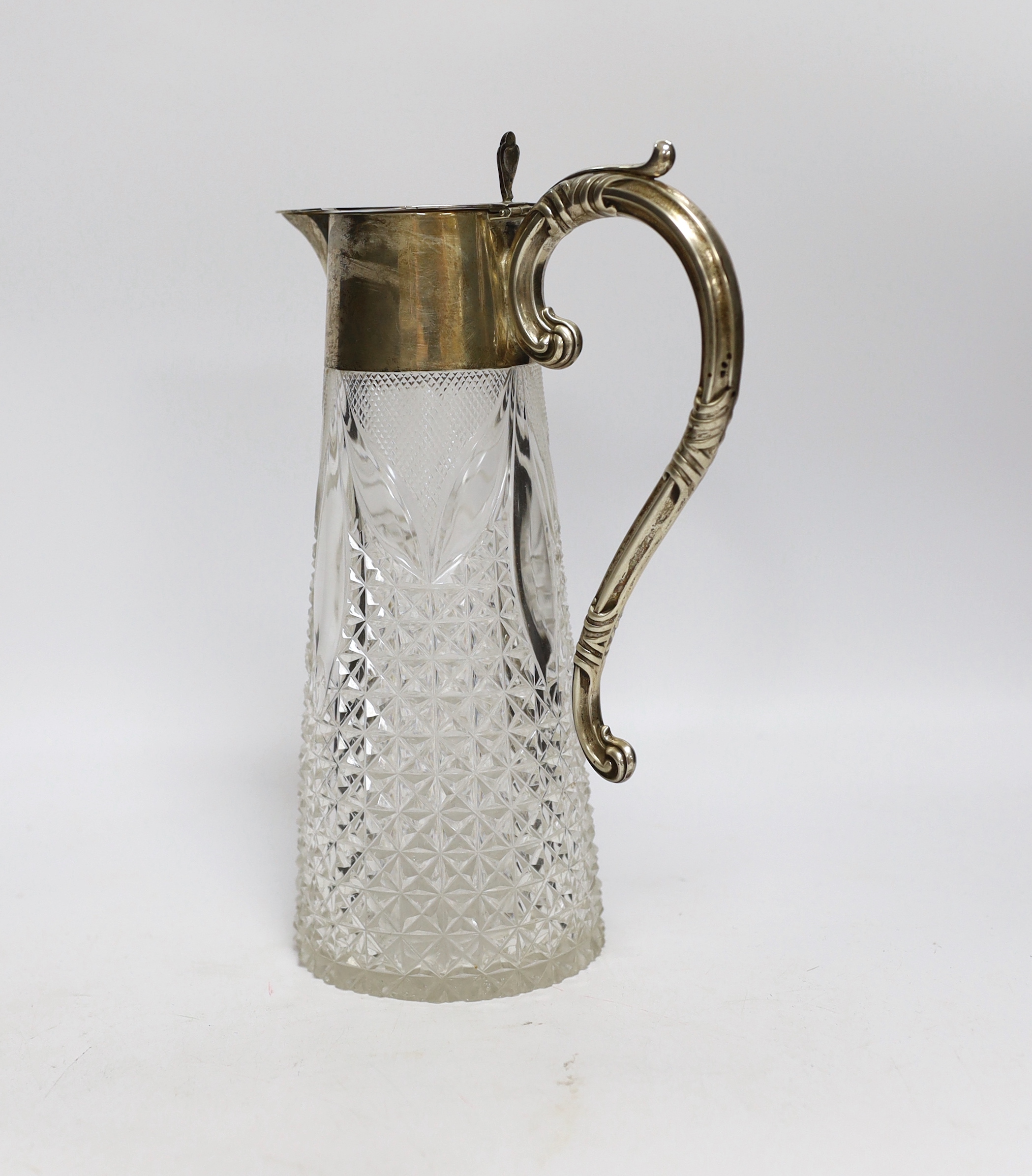 An Edwardian silver mounted cut glass claret jug, William Henry Sparrow, Birmingham, 1903, 26cm.